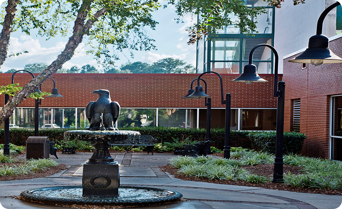 Eagle Fountain in front of a building