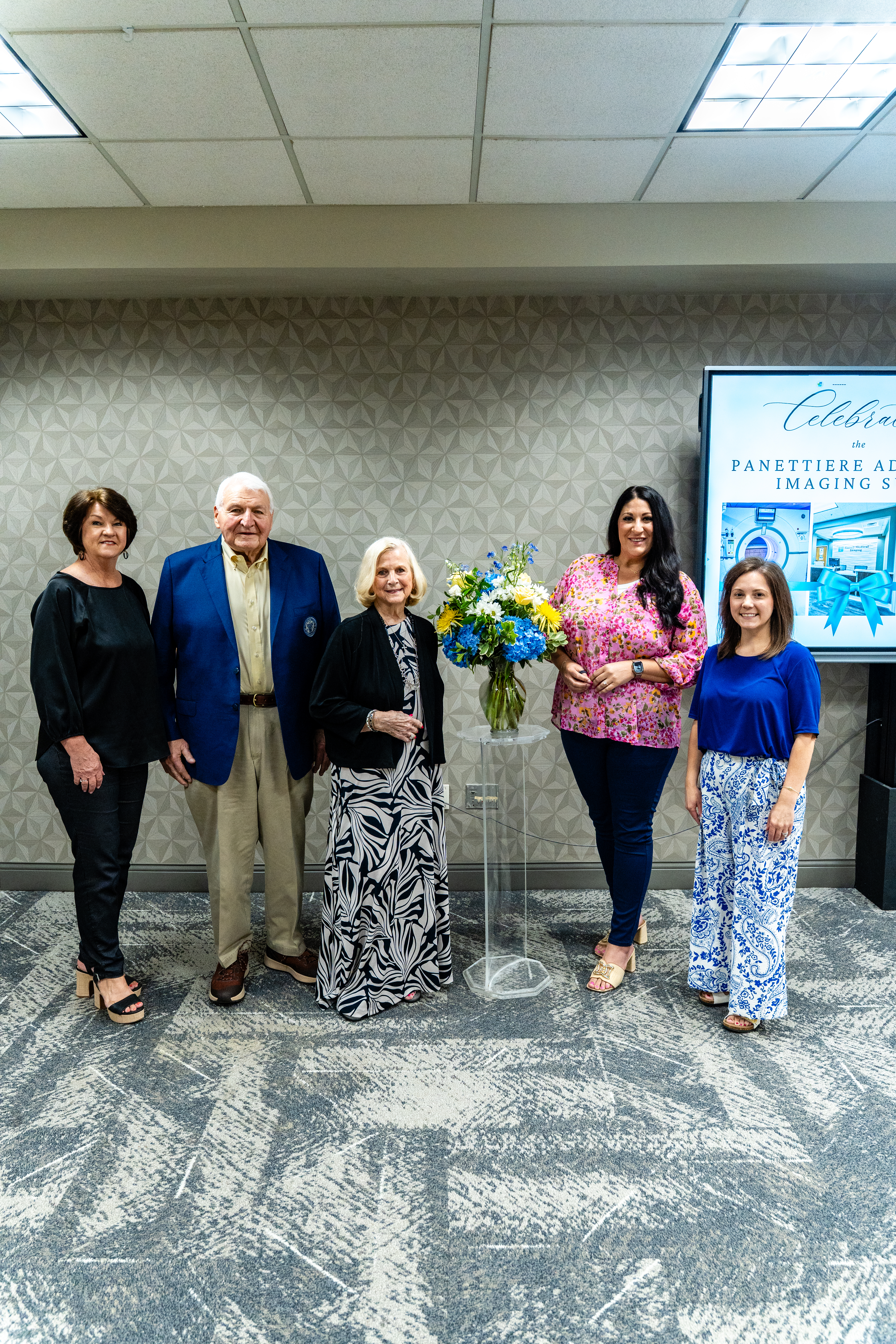 Our team hero image of man talking to woman